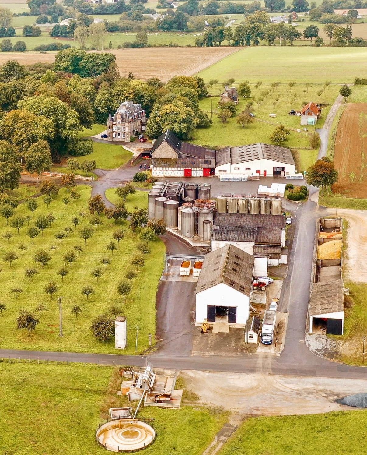 Domaine du Coquerel — aerial view of the estate, distillery and orchards